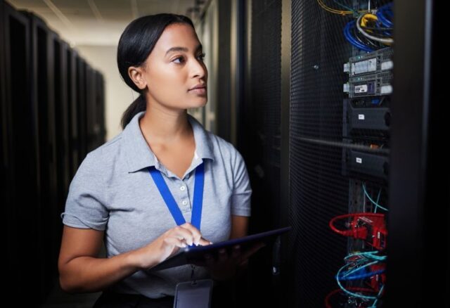 Woman tablet and thinking in server room program