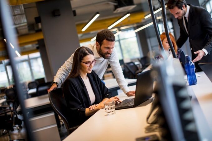 Group of young business people in the modern office